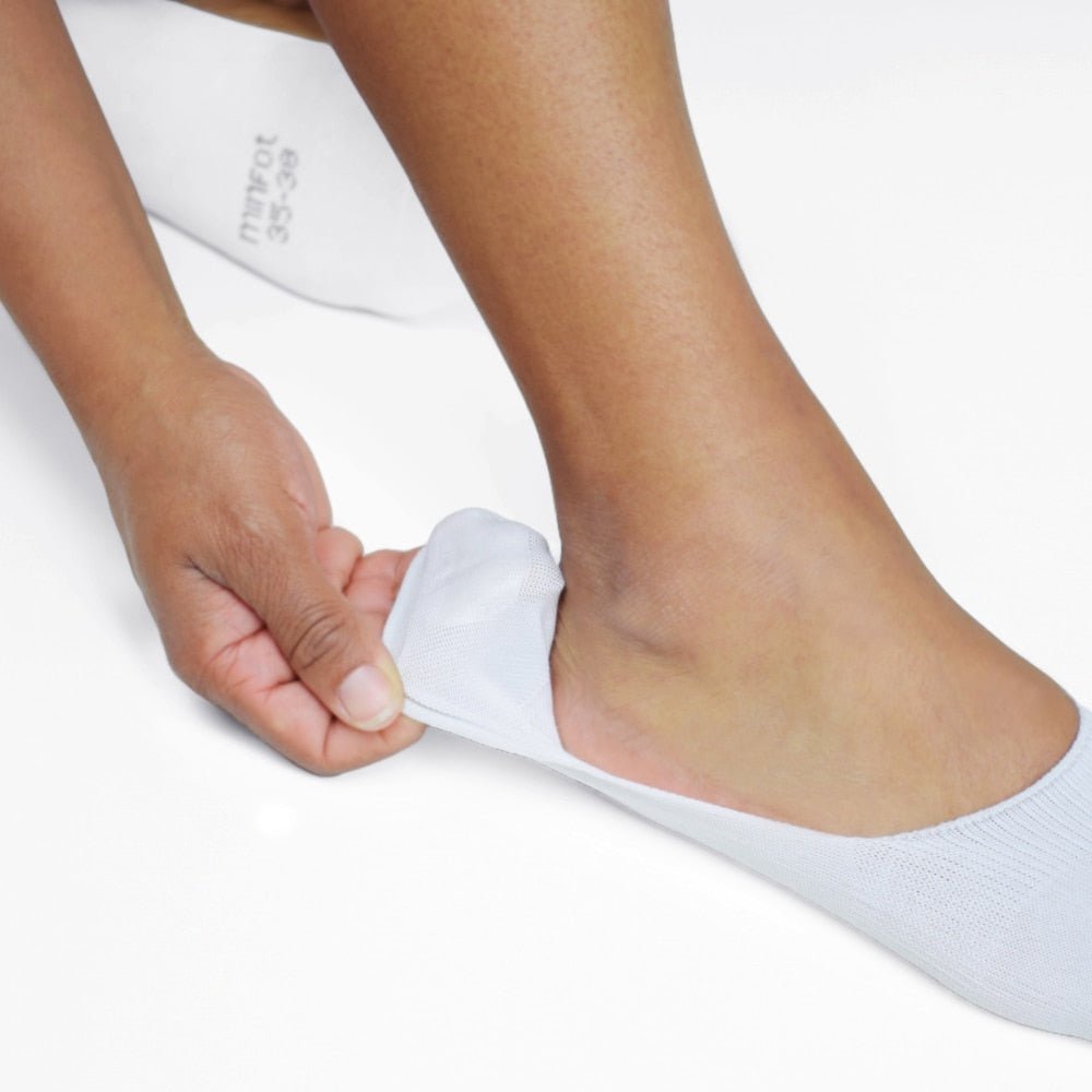 vita-strumpor-till-laga-skor-minfot